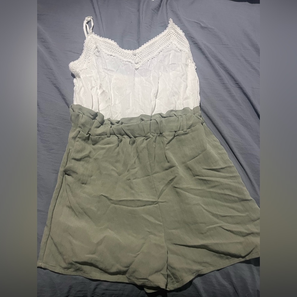 I am selling a romper large with a cute lace on top and stretchable waist band
